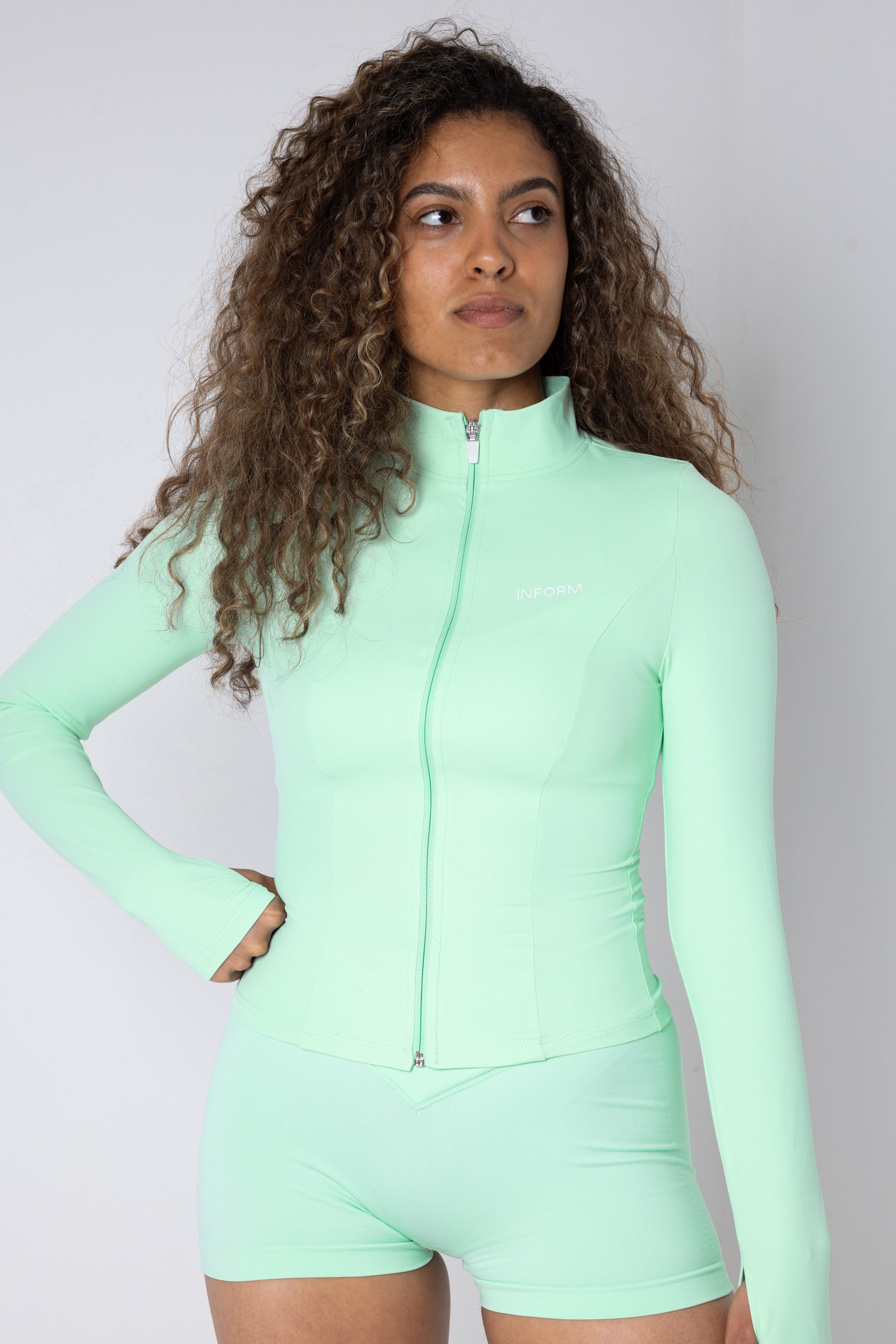 FEMALE LA FORM GREEN WORKOUT GYM ZIPPER - INFORM ACTIVE
