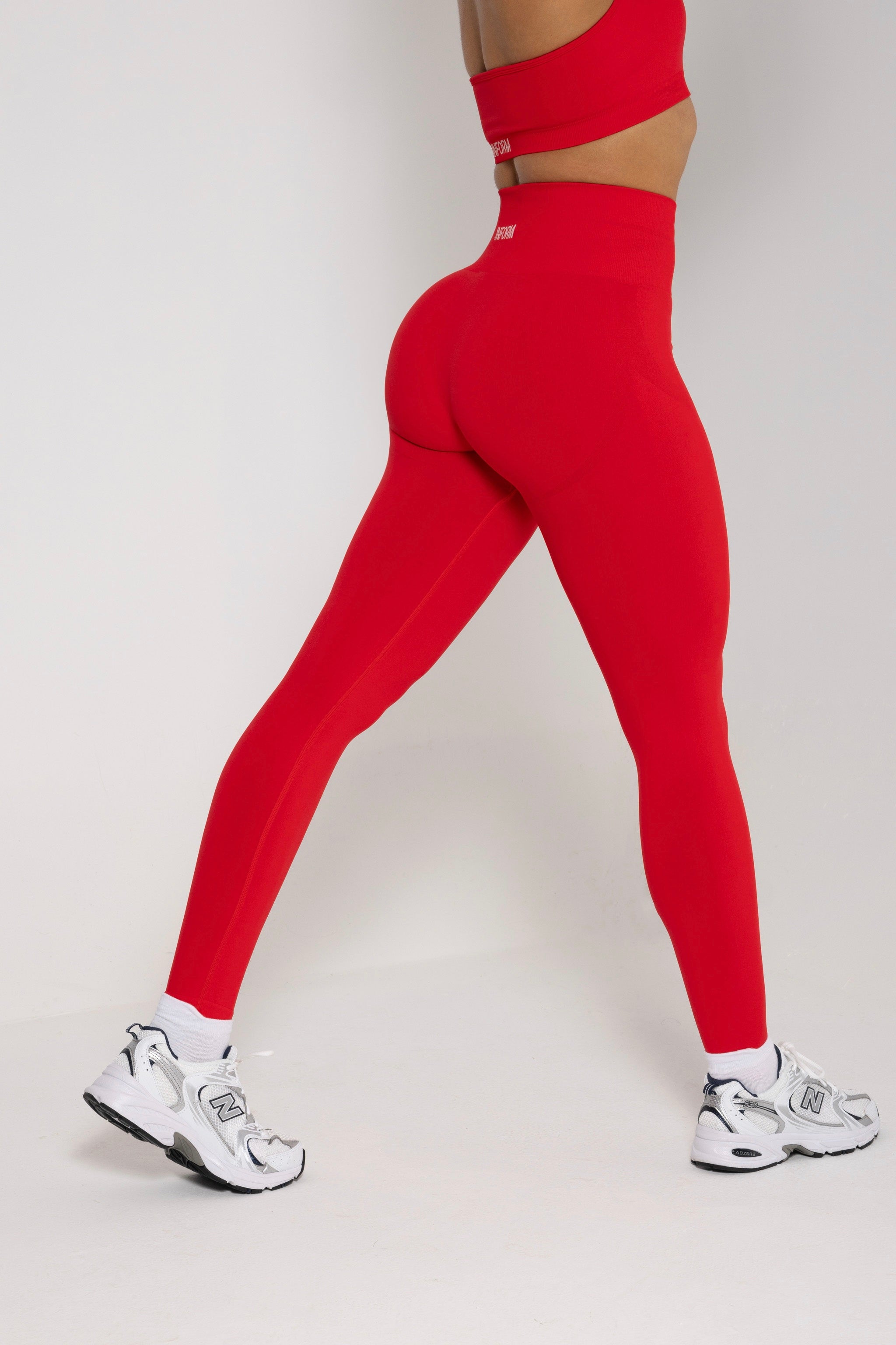 FEMALE REFORM RED WORKOUT GYM LEGGINGS - INFORM ACTIVE