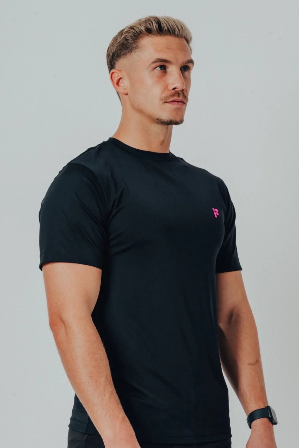 MALE TRANSFORM BLACK AND PINK TECHNICAL SHORT SLEEVE GYM WORKOUT TOP - INFORM ACTIVE