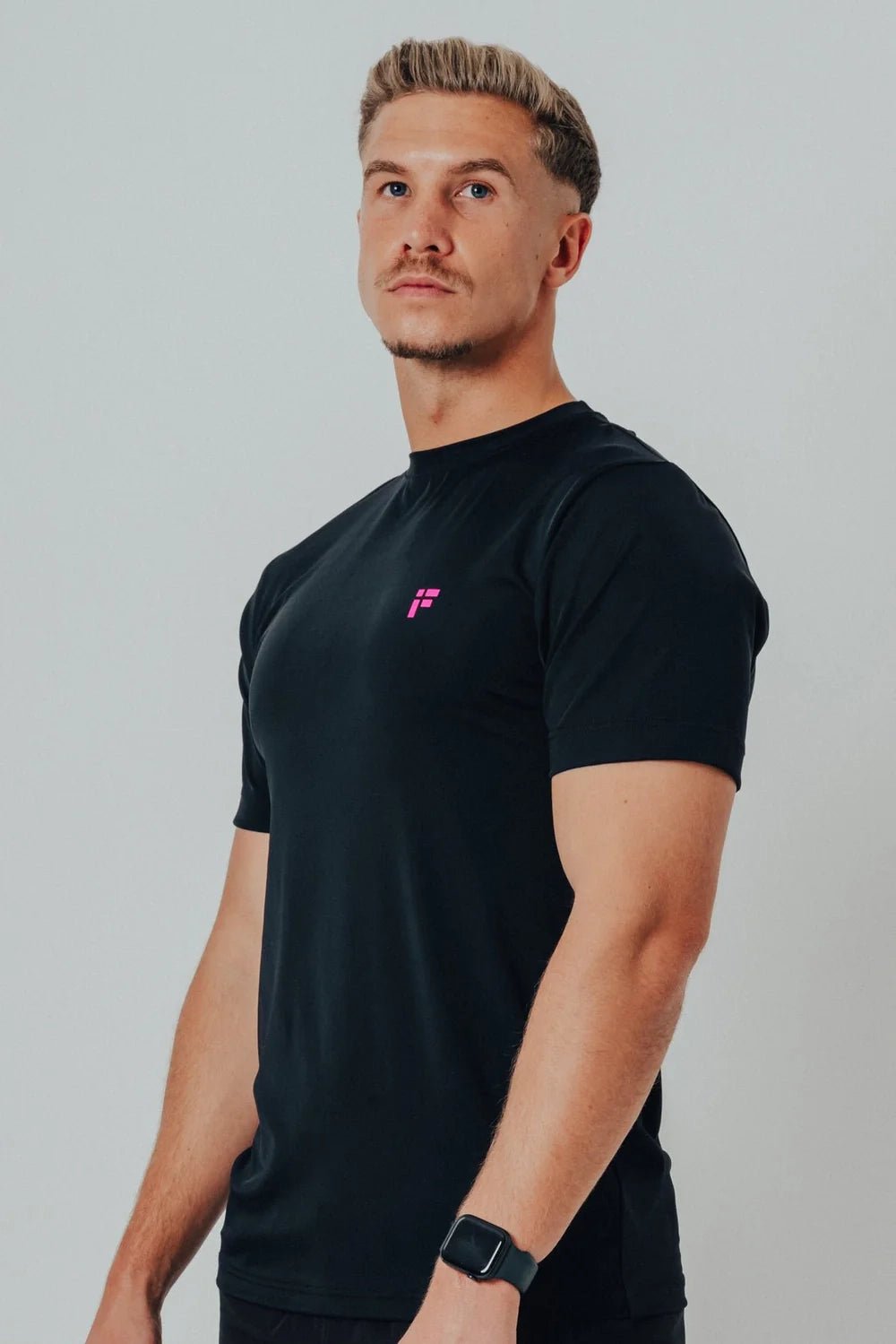 MALE TRANSFORM BLACK AND PINK TECHNICAL SHORT SLEEVE GYM WORKOUT TOP - INFORM ACTIVE