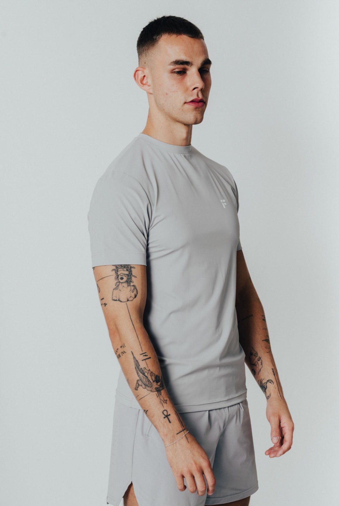 MALE TRANSFORM GREY TECHNICAL SHORT SLEEVE GYM WORKOUT TOP - INFORM ACTIVE