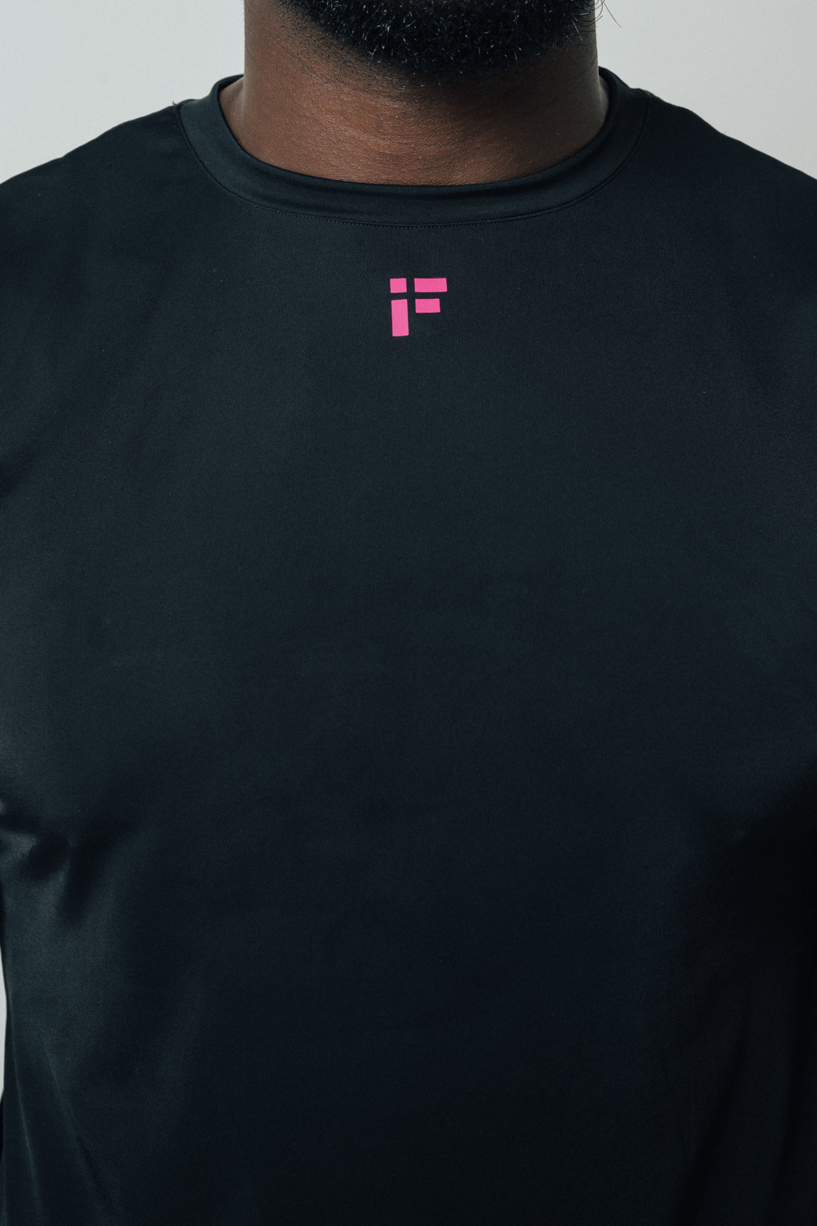 MALE TRANSFORM BLACK AND PINK TECHNICAL SLEEVELESS GYM WORKOUT TOP - INFORM ACTIVE