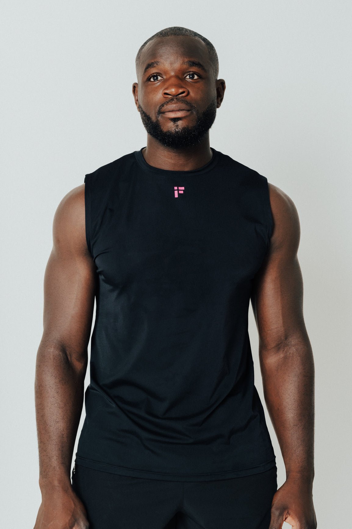 MALE TRANSFORM BLACK AND PINK TECHNICAL SLEEVELESS GYM WORKOUT TOP - INFORM ACTIVE