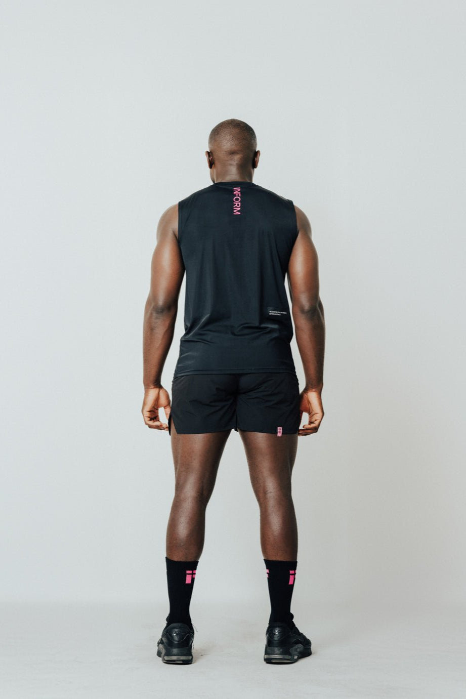 MALE TRANSFORM BLACK AND PINK TECHNICAL SLEEVELESS GYM WORKOUT TOP - INFORM ACTIVE