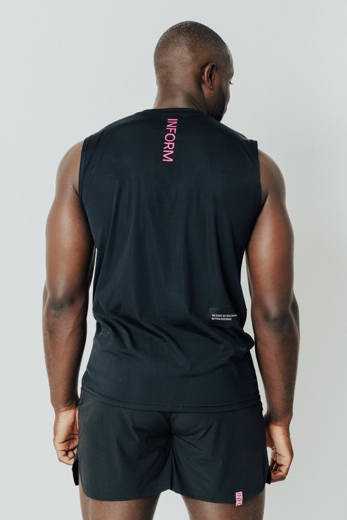 MALE TRANSFORM BLACK AND PINK TECHNICAL SLEEVELESS GYM WORKOUT TOP - INFORM ACTIVE