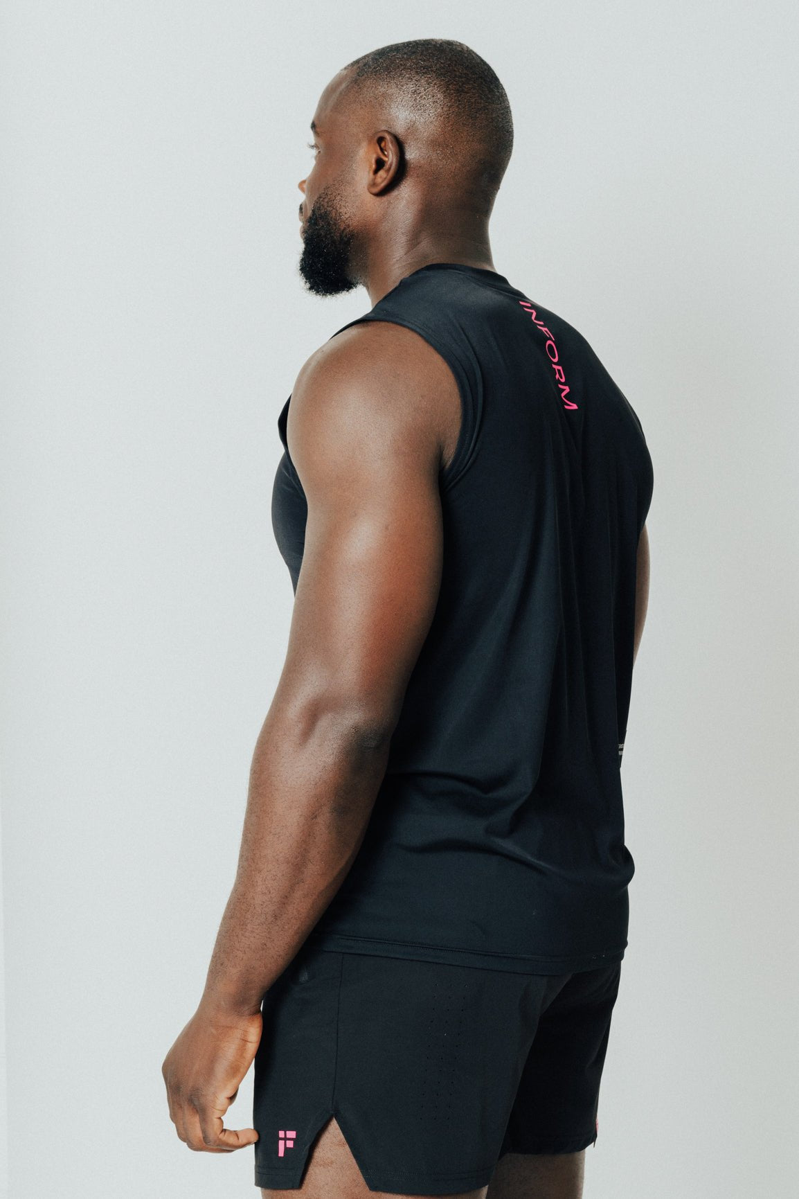MALE TRANSFORM BLACK AND PINK TECHNICAL SLEEVELESS GYM WORKOUT TOP - INFORM ACTIVE
