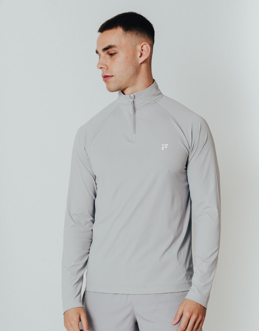 TRA - QUARTER ZIP TRAINING TOP - INFORM ACTIVE