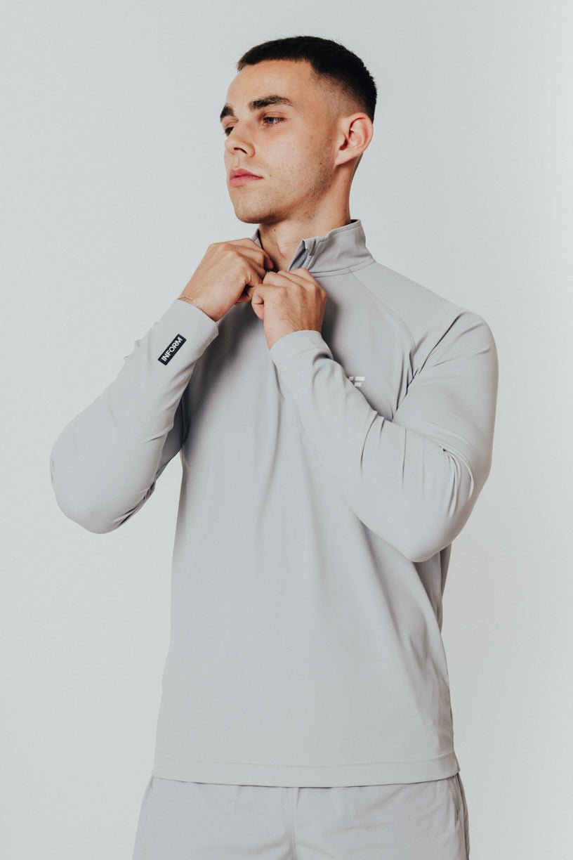 TRA - QUARTER ZIP TRAINING TOP - INFORM ACTIVE