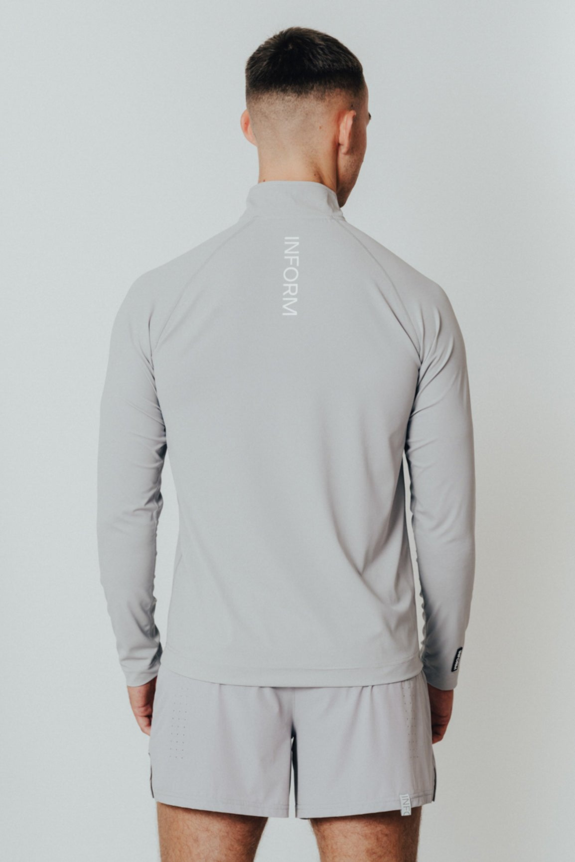 TRA - QUARTER ZIP TRAINING TOP - INFORM ACTIVE