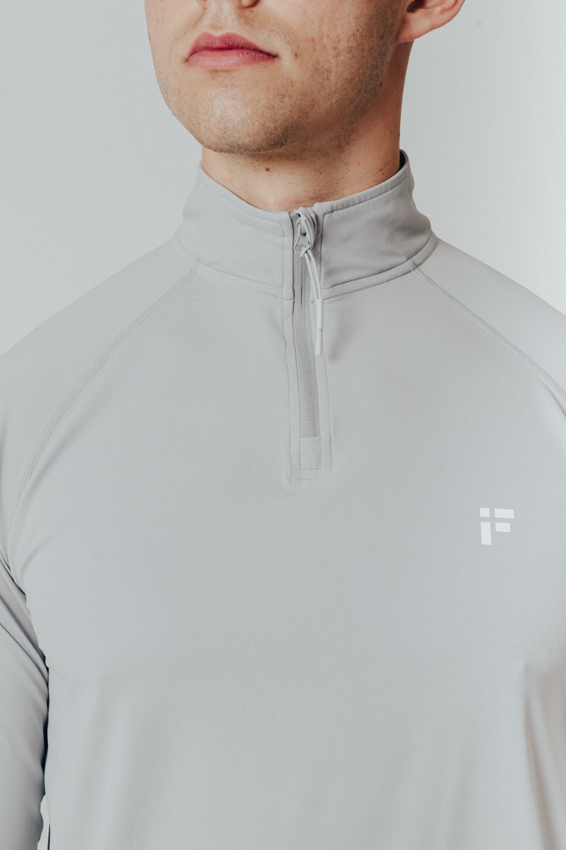 TRA - QUARTER ZIP TRAINING TOP - INFORM ACTIVE